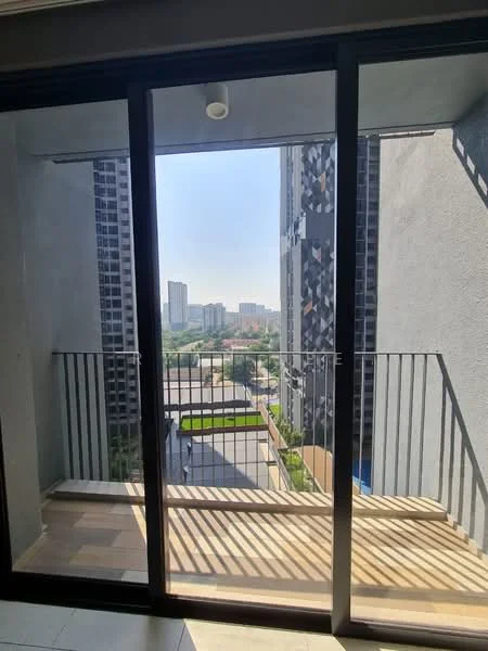 Balcony features: glass sliding door, metal railing, wooden flooring, city view, sunlight casting shadows, open space, surrounded by high-rise buildings; style: modern; view: city.