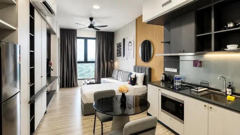 Living features: floor-to-ceiling windows, grey upholstered sofa, queen-size bed, black dining table with four chairs, stainless-steel fridge, built-in microwave, black countertop, white cabinetry, recessed downlights, ceiling fan, wooden flooring, decorative wall art, curtains, open shelving; style: modern; view: city.