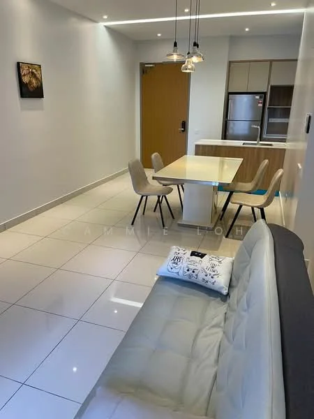 Living features: grey fabric sofa, white throw pillow with print, white dining table, 4 beige dining chairs, recessed ceiling lights, pendant lights above dining table, glossy white tile flooring, white painted walls, wooden door, kitchen area with built-in cabinets, stainless-steel fridge; style: modern.