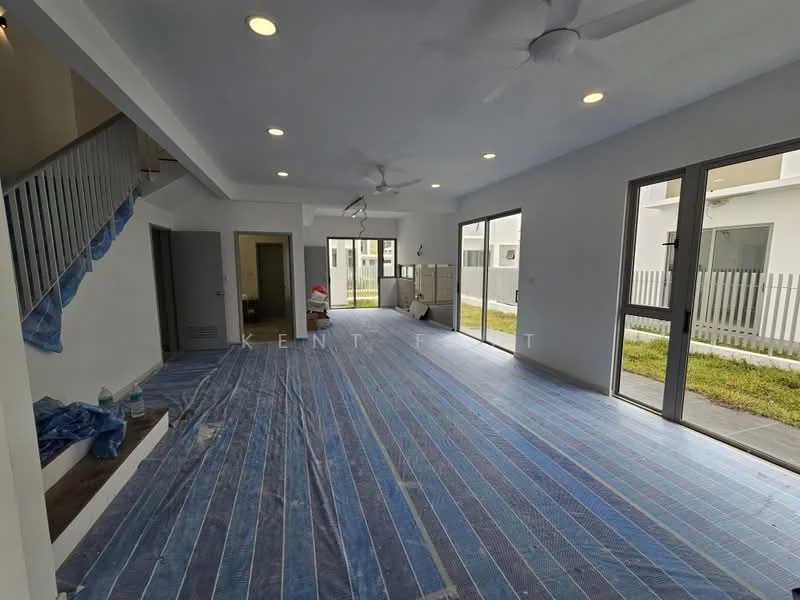 Living features: blue striped vinyl flooring, white painted walls, recessed downlights, 2 ceiling fans, large sliding glass doors, floor-to-ceiling windows, open layout, unfinished space with construction materials; style: modern; view: garden. Room features: white painted walls, blue striped vinyl flooring, doorway leading to another room, staircase visible.