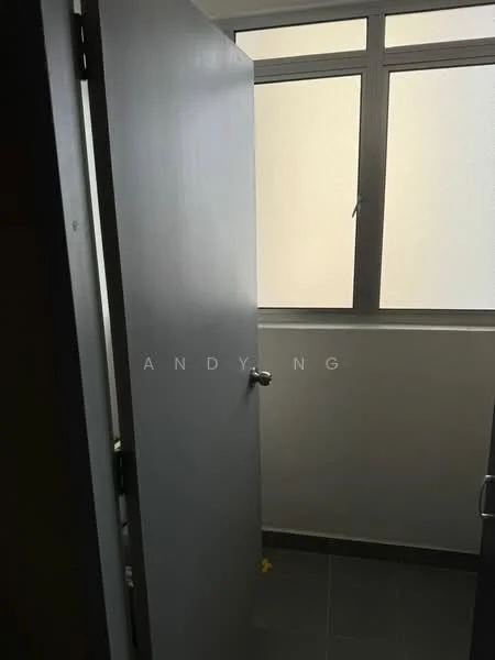 Room features: grey door, floor-to-ceiling window, grey tiled flooring, white walls, natural light from window.
