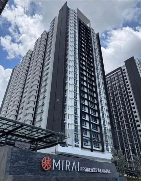 Exterior type: high-rise condominium; features: glass curtain wall, white painted facade, black accent panels, recessed balconies, approximately 20-storey high-rise, landscaped entrance, signage at base, surrounded by urban context; style: modern.