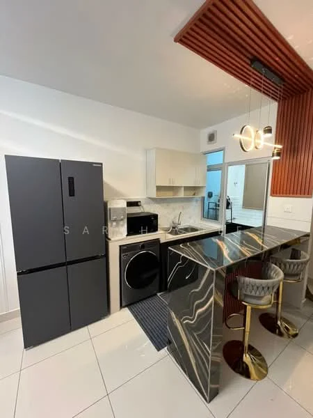 Kitchen features: black stainless-steel fridge, built-in microwave, freestanding washing machine, marble countertop, white shaker cabinets, grey backsplash, pendant lighting, bar seating with gold stools, open shelving, tile flooring, wood panel accent wall; style: modern.