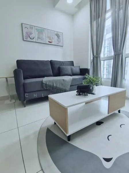 Living features: 3-seater fabric sofa in grey, coffee table with white top and wooden legs, area rug with cartoon face design, floor-to-ceiling windows, sheer curtains, decorative plant on coffee table, wall-mounted artwork with floral designs, white painted walls, tile flooring; style: modern.