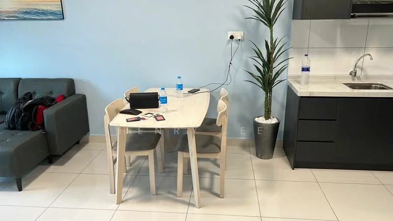Dining features: 4-seater dining table, light wood dining chairs, white tabletop, ceramic tile flooring, potted plant, water bottles on table, black electronic device on table, grey sofa in background, wall-mounted electrical outlet; style: modern.