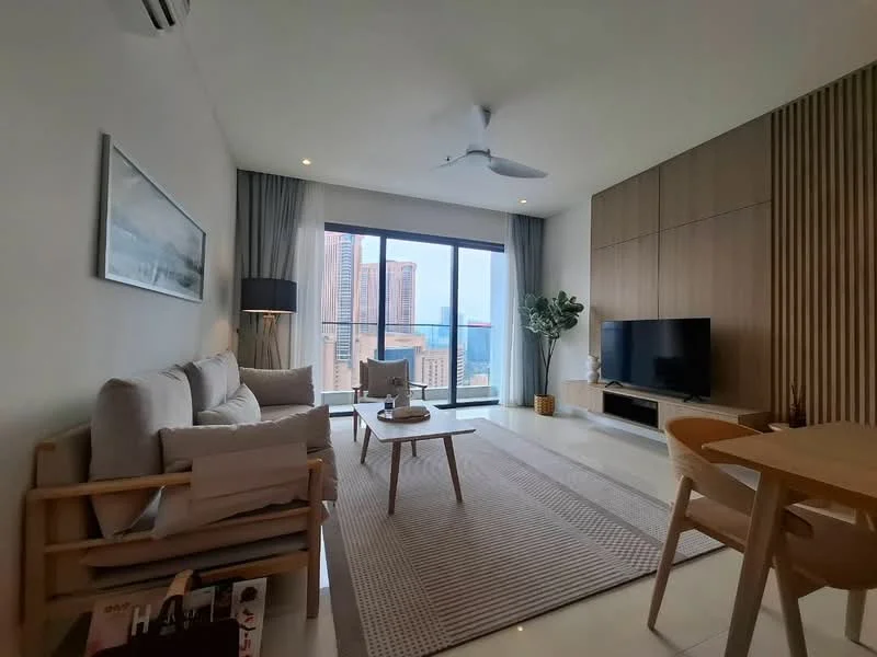 Living features: 3-seater fabric sofa in light grey, wooden armchair, coffee table, area rug with geometric pattern, wall-mounted TV, TV console, floor-to-ceiling windows, city view, recessed downlights, ceiling fan, decorative plant in pot, wood panel accent wall, light-coloured walls, light-coloured flooring; style: modern; view: city.
