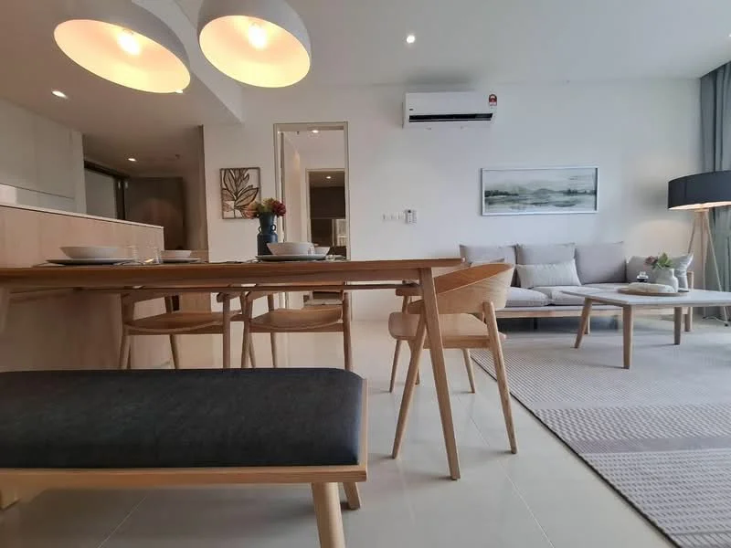 Living features: 3-seater fabric sofa in light grey, wooden coffee table, area rug with geometric pattern, floor lamp with black shade, wall-mounted air conditioning unit, framed artwork on wall, dining table with wooden finish, 4 wooden dining chairs, bench seating with dark fabric, light fixtures with circular design, large window with sheer curtains, light-colored tiled flooring; style: modern.