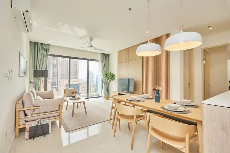 Living features: floor-to-ceiling windows, city view, light wood flooring, recessed downlights, 5-blade ceiling fan, beige fabric sofa, wooden coffee table, TV console, wall-mounted TV, decorative vase with flowers, area rug, curtains, wood panel accent wall; style: modern; view: city. Dining features: 6-seater wooden dining table, upholstered dining chairs, pendant lighting, decorative table setting; style: modern; view: city.