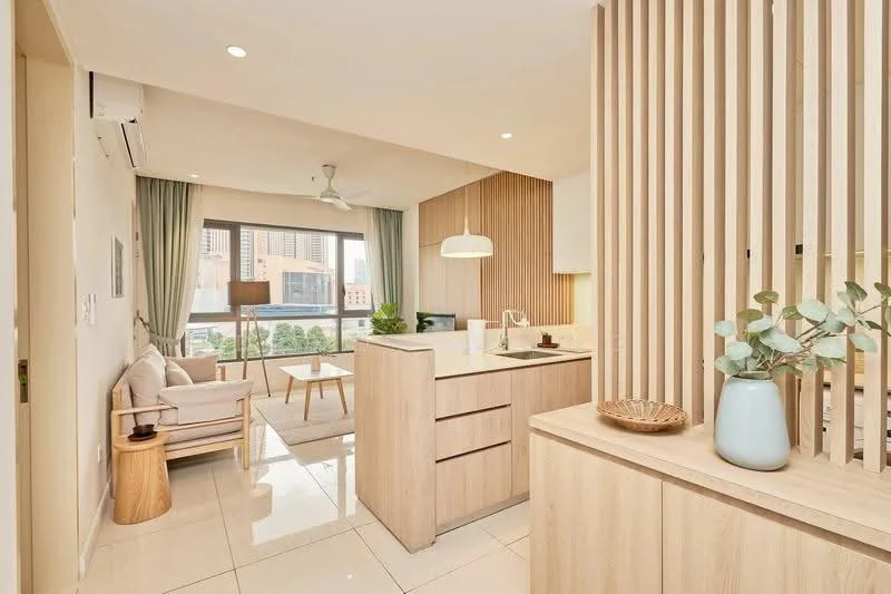 Kitchen features: light wood cabinetry, white countertop, single-bowl stainless-steel sink, chrome pull-down faucet, built-in oven, stainless-steel range hood, 4-burner gas hob, pendant light, recessed downlights, open shelving, tile flooring, window with city view, light wood partition, greenery visible outside; style: modern; view: city. Living features: 3-seater fabric sofa in light grey, wooden side table, area rug, floor-to-ceiling windows, curtains, ceiling fan, decorative plants; style: modern; view: city.