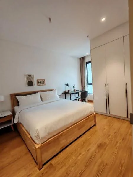 Bedroom features: queen-size bed with wooden frame, white bedding, wooden flooring, built-in wardrobe with sliding doors, desk with chair, table lamp, wall art, floor-to-ceiling window, curtains, light fixtures in ceiling; style: modern; view: city.