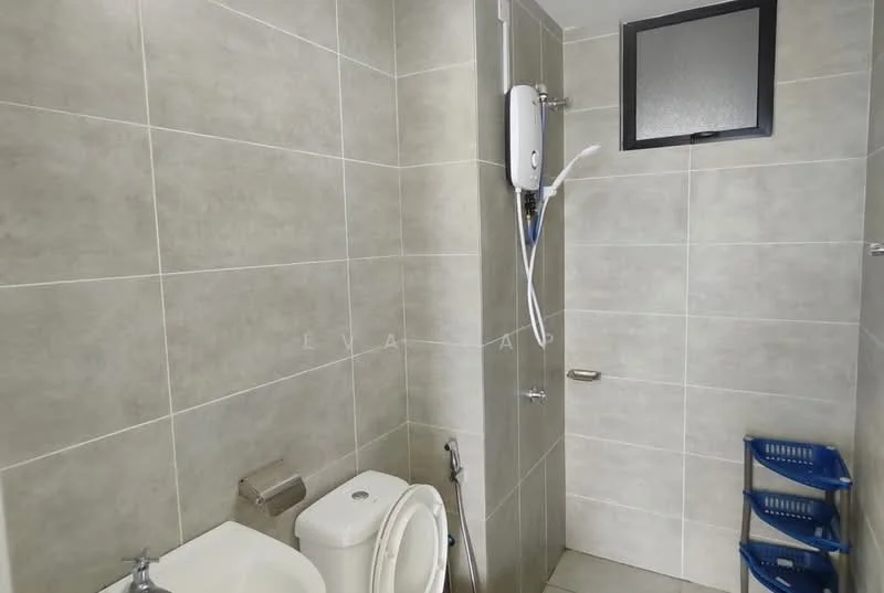 Bathroom features: grey ceramic tile flooring, light grey wall tiles, white toilet, chrome basin mixer faucet, shower area with glass partition, handheld shower, water heater, toilet paper holder, blue storage baskets; style: modern.