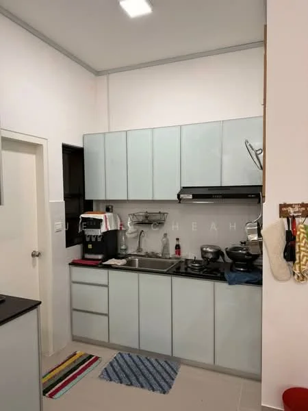 Kitchen features: light blue cabinetry, black countertop, single-bowl stainless-steel sink, chrome pull-down faucet, built-in stove, exhaust hood, microwave, coffee machine, kettle, various cooking pots, dish rack, colorful area rug, white walls, recessed ceiling lights; style: modern.