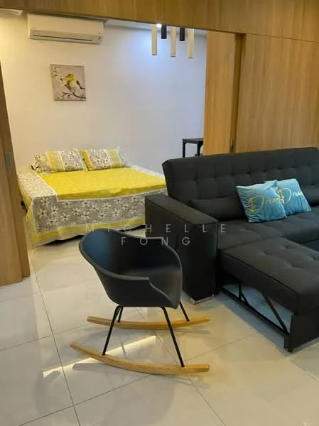 Living features: grey fabric sofa, yellow and grey patterned bedspread, white walls, white tiled flooring, wall-mounted split AC, rocking chair with wooden legs, decorative blue cushion, recessed ceiling lights; style: modern.