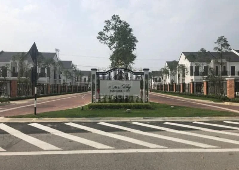 Exterior type: linked terrace house; features: gated entrance, brick pillars, manicured landscaping, paved driveway, signage with community name, surrounding greenery, two-storey houses, white painted facade, sloping roofs, street signage, marked pedestrian crossing; style: modern.