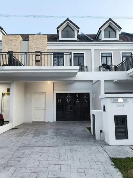 Exterior type: linked terrace house; features: two-storey building, white painted facade, stone cladding accents, pitched roof, balconies with black railings, driveway with stamped concrete, front lawn, main entrance door, garage door, windows with white frames; style: modern.
