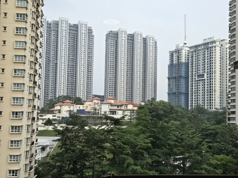 Exterior type: high-rise condominium; features: multiple high-rise buildings, urban skyline, surrounded by greenery, construction site visible, residential buildings in foreground, city view, modern architectural design; style: modern.