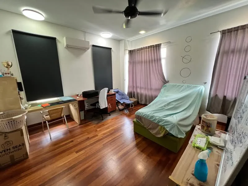 Bedroom features: wooden flooring, 2 windows with black roller blinds, 1 wall-mounted split AC, 5-blade ceiling fan, double bed with green bed frame, study desk with chair, whiteboard, decorative wall circles, curtains in light purple, cardboard boxes, small table, area rug; style: modern.
