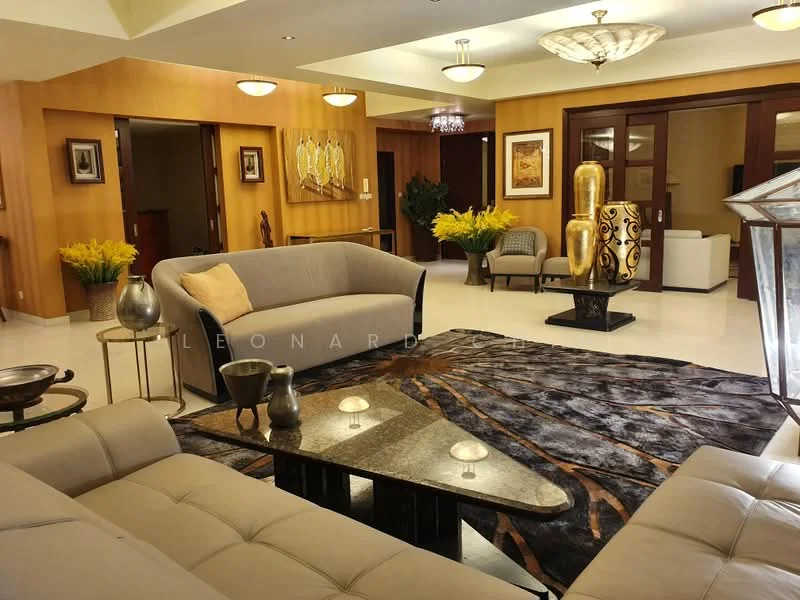 Living features: cream fabric sofa, 3-seater sofa, 2-seater sofa, coffee table with marble top, area rug with abstract pattern, decorative vases, framed artwork on walls, recessed ceiling lights, chandelier, wall-mounted artwork, potted plants, wooden accent wall, glass decorative object; style: contemporary.