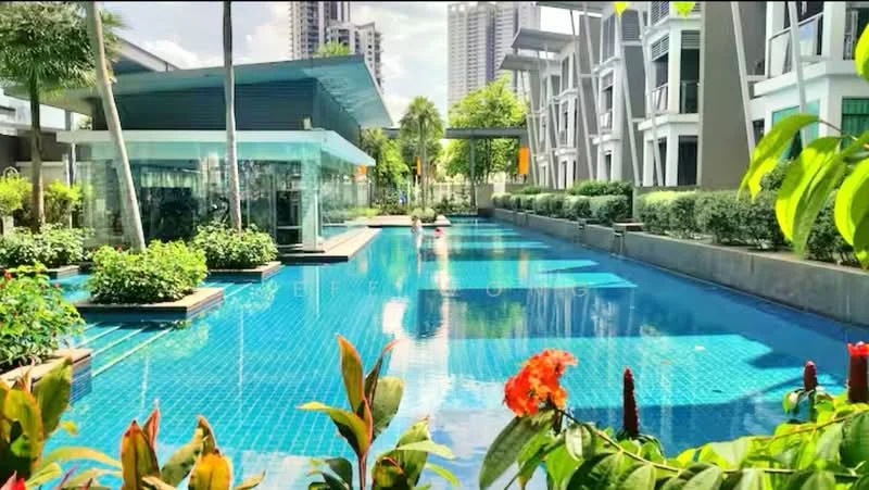 Exterior type: swimming pool deck; features: infinity pool, pool deck with loungers, landscaped garden with tropical plants, manicured hedges, modern clubhouse, surrounded by high-rise buildings, clear blue water, sunny weather, paved walkway; style: modern.