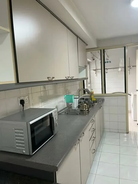 Kitchen features: light grey cabinetry, black granite countertop, stainless-steel single-bowl sink, chrome pull-down faucet, built-in microwave, ceramic tile flooring, white tiled backsplash, wall-mounted cabinets, open shelving, window with view to laundry area; style: modern.