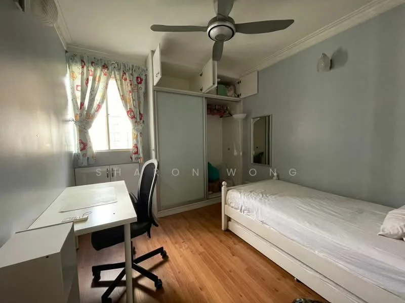 Bedroom features: single bed, wooden flooring, light blue painted walls, ceiling fan, built-in wardrobe, desk with chair, curtains with floral pattern, mirror, wall-mounted light fixtures.