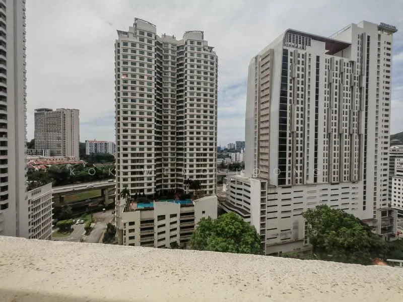 Exterior type: high-rise condominium; features: glass curtain wall, recessed balconies, multiple-storey buildings, surrounded by greenery, city skyline in background, swimming pool visible on lower levels; style: modern.