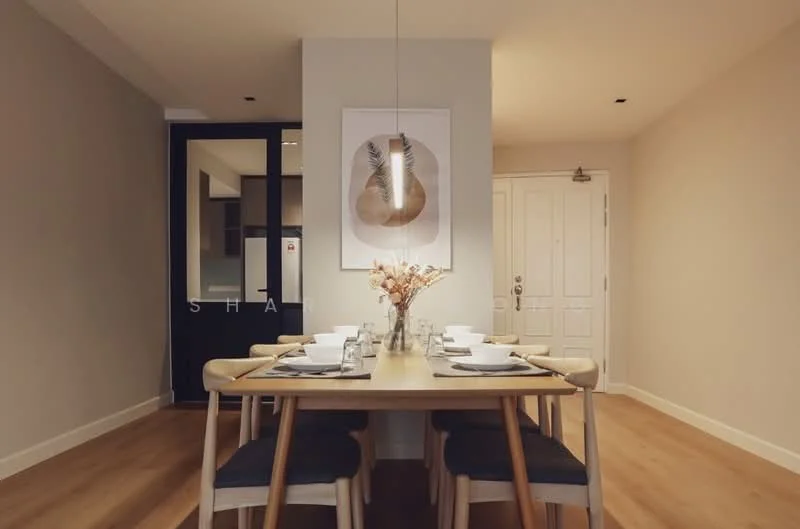Dining features: wooden dining table, 6-seater dining table, upholstered dining chairs, pendant light fixture, framed artwork on wall, decorative vase with flowers, light wood flooring, neutral painted walls; style: modern. Room features: white painted walls, doorway leading to another room.