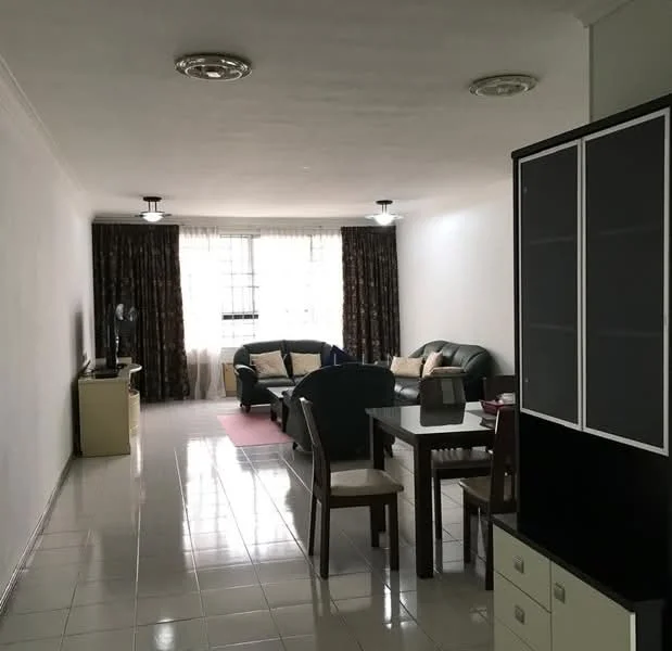 Living features: white painted walls, glossy tile flooring, 2-seater leather sofa in green, 3-seater fabric sofa in dark green, coffee table, TV console, wall-mounted TV, floor-to-ceiling windows with sheer curtains, recessed ceiling lights, decorative wall clock, area rug, dining table with 4 chairs, sideboard cabinet; style: contemporary.