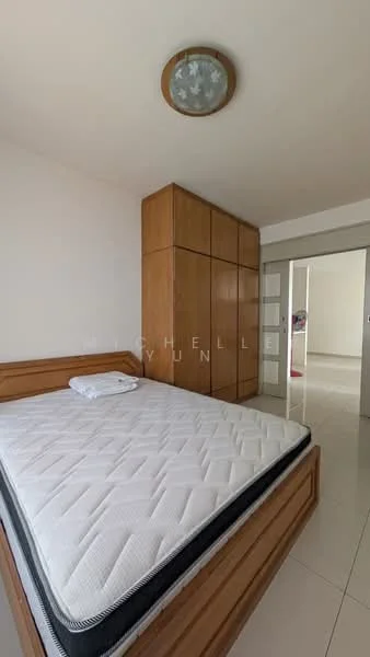 Bedroom features: queen-size bed, wooden bed frame, mattress with white bedding, built-in wardrobe with wooden finish, white painted walls, tile flooring, ceiling light fixture, sliding glass door, neutral color scheme; style: modern.