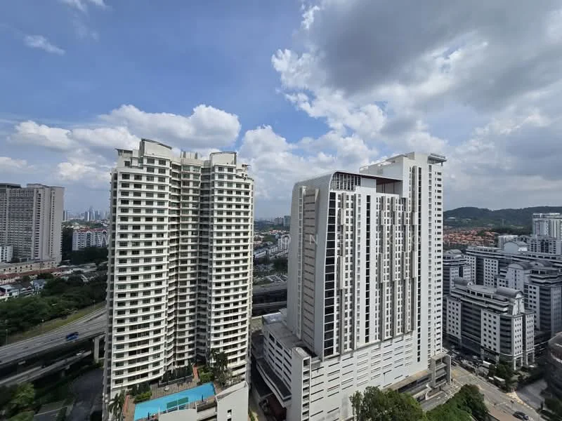 Exterior type: high-rise condominium; features: glass curtain wall, white painted facade, recessed balconies, surrounded by mature greenery, urban context with city skyline in background, multiple storeys, swimming pool deck visible; style: modern.