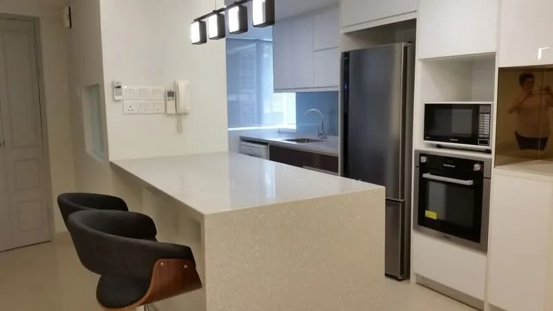 Kitchen features: white cabinetry, grey quartz countertop, stainless-steel fridge, built-in microwave, built-in oven, dishwasher, single-bowl stainless-steel sink, chrome pull-down faucet, pendant lighting, bar seating with two chairs, white tiled backsplash, open layout; style: modern.