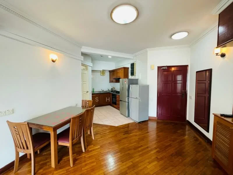 Kitchen features: wooden flooring, white painted walls, crown moulding, recessed ceiling lights, brown wooden cabinetry, stainless-steel fridge, built-in oven, 4-burner gas hob, kitchen countertop, dining table with 4 wooden chairs; style: modern.