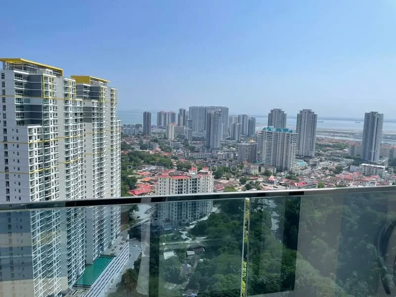 Exterior type: high-rise condominium; features: glass balcony railing, city skyline view, surrounded by high-rise buildings, sea view in background, urban landscape, clear blue sky; style: modern.