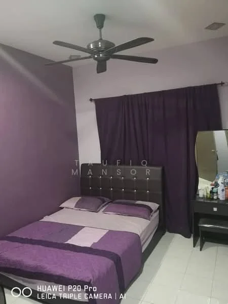 Bedroom features: purple painted walls, white ceiling, 5-blade ceiling fan, queen-size bed with upholstered headboard, purple bedspread, matching purple pillows, nightstand with mirror, dressing table, floor tiles, curtains in dark purple, decorative items on the dresser; style: modern.