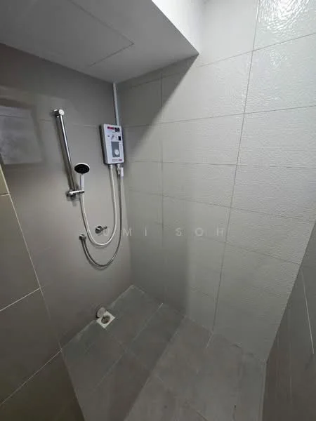 Bathroom features: walk-in shower, chrome handheld showerhead, wall-mounted shower control, grey ceramic wall tiles, grey ceramic floor tiles, drain on floor, white ceiling, no visible window; style: modern.