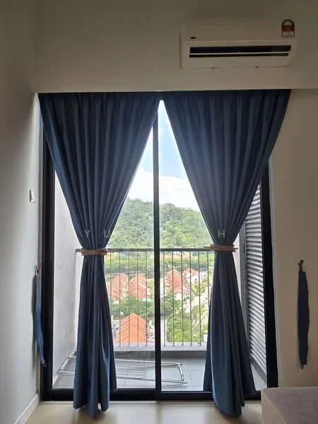 Room features: floor-to-ceiling windows, blue curtains, balcony with railing, view of surrounding greenery, wall-mounted split AC; view: garden.
