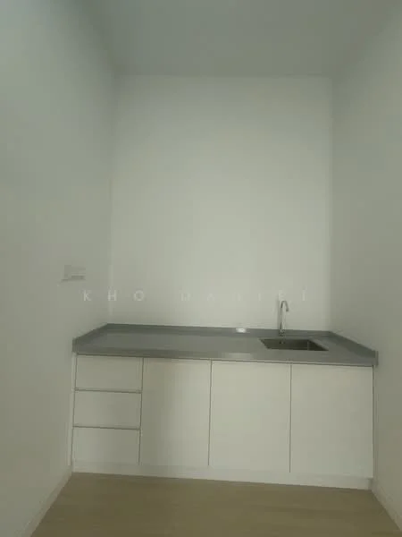 Kitchen features: white cabinetry, grey countertop, single-bowl stainless-steel sink, chrome faucet, drawer storage, minimalist design, plain white walls, light wood flooring; style: modern.