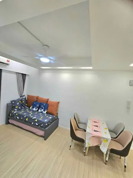 Living features: sofa bed with patterned bedding, decorative cushions in orange and blue, light wood flooring, recessed ceiling lights, 5-blade ceiling fan, dining table with pink tablecloth, 4 dining chairs in beige and pink, curtains in grey, wall-mounted air conditioning unit, white painted walls; style: modern.
