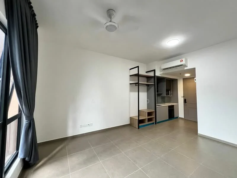 Living features: grey tiled flooring, white painted walls, ceiling fan, wall-mounted split AC, large window with black frame, dark grey curtains, built-in shelving unit, kitchenette area with countertop, door leading to hallway; style: modern.