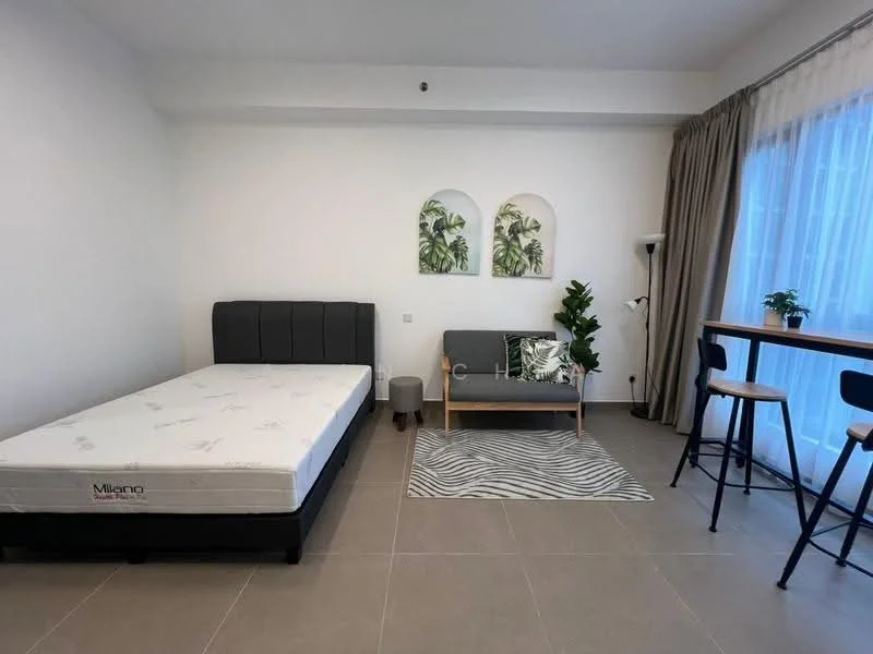 Room features: grey upholstered bed frame, mattress on bed frame, sofa in grey fabric, wooden bar table, two black bar stools, area rug with zebra pattern, floor-to-ceiling window with sheer curtains, potted plant, wall-mounted lamp, white painted walls, light grey tile flooring; style: modern.