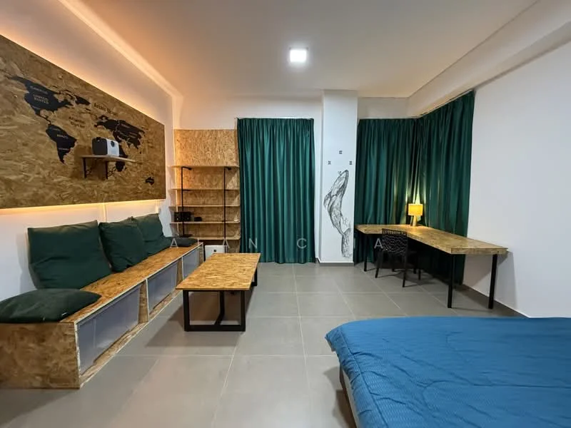 Room features: green curtains, wooden wall panel with world map design, sofa with green cushions, wooden coffee table, two wooden desks, tile flooring, table lamp, wall-mounted shelving unit, blue bedspread, recessed ceiling lights; style: modern.