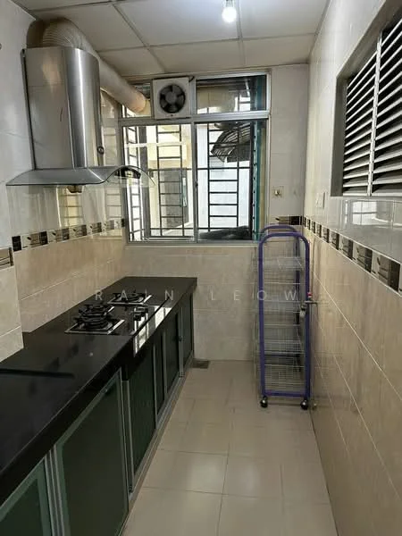 Kitchen features: black granite countertop, stainless-steel gas hob with 2 burners, stainless-steel range hood, green cabinetry with glass panels, tile backsplash with decorative border, white tiled walls, cream tiled flooring, window with metal grilles, exhaust fan, metal shelving unit; style: modern.