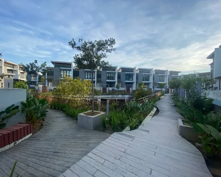 Exterior type: linked terrace house; features: manicured landscaping, paved walkway, mature trees, garden beds with plants, modern architectural design, multiple storey houses, open green spaces, fenced garden area; style: modern.