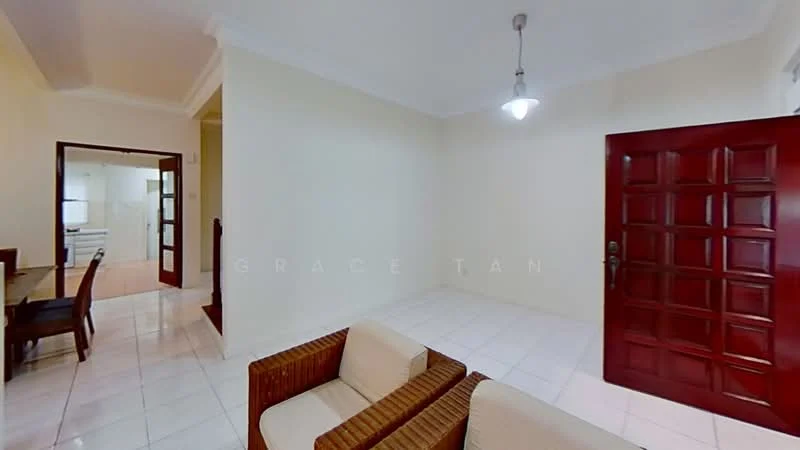 Living features: white painted walls, glossy white tile flooring, ceiling light fixture, two-seater fabric sofa, wooden armchair, wooden door with decorative panels, open layout to dining area, natural light from window; style: modern. Dining features: wooden dining table, four wooden dining chairs, white painted walls, glossy white tile flooring, open layout to living area; style: modern.
