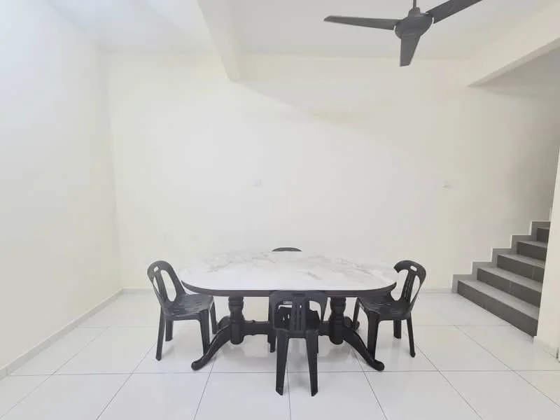 Dining features: oval marble dining table, 4 black plastic dining chairs, white tiled flooring, plain white walls, ceiling fan, staircase in background; style: modern.