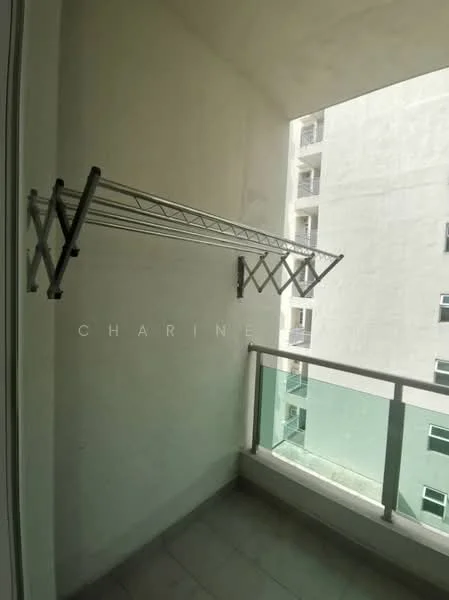 Room features: balcony, metal drying rack, glass railing, grey tiled flooring, white walls, exposed concrete wall; style: modern.