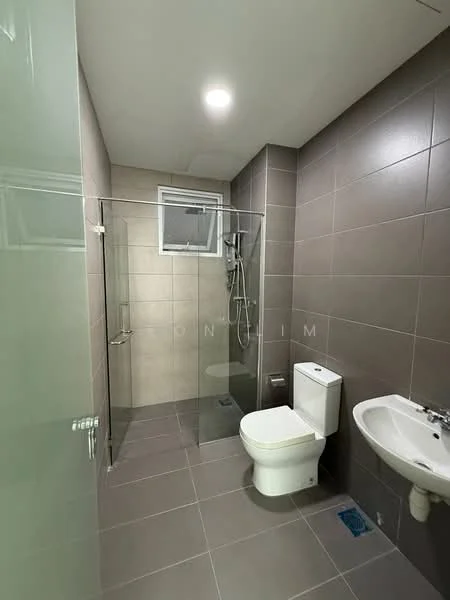 Bathroom features: grey tiled walls, light grey tiled flooring, walk-in shower with glass enclosure, rain shower head, handheld shower, one-piece toilet, single-sink vanity, chrome basin mixer, window for natural light, recessed ceiling lights; style: modern.