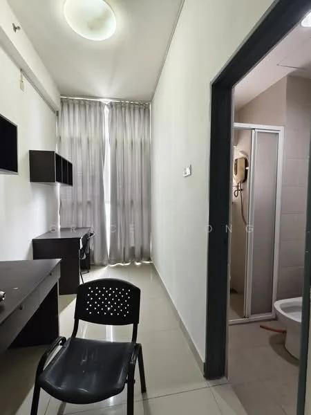 Room features: white painted walls, glossy tile flooring, ceiling light fixture, curtains, desk with wall-mounted TV, black plastic chair, doorway leading to bathroom, shower cubicle, toilet, sink, mirror; style: modern.