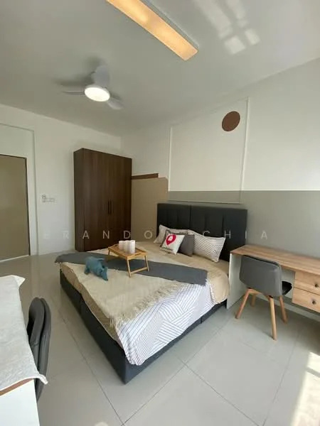 Bedroom features: king-size bed with grey upholstered headboard, white and grey bedding, wooden bedside table, decorative pillow, study desk with chair, built-in wardrobe, ceiling fan, white walls, tile flooring, window with natural light; style: modern.