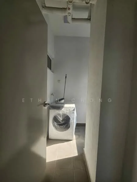 Laundry features: front-load washing machine, grey tiled flooring, white painted walls, window for natural light, ceiling pipes visible, door leading to hallway.